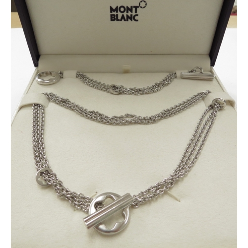 6378 - A Mont Blanc silver chainlink necklace, centre star shaped roundel featuring the Mont Blanc signatur... 