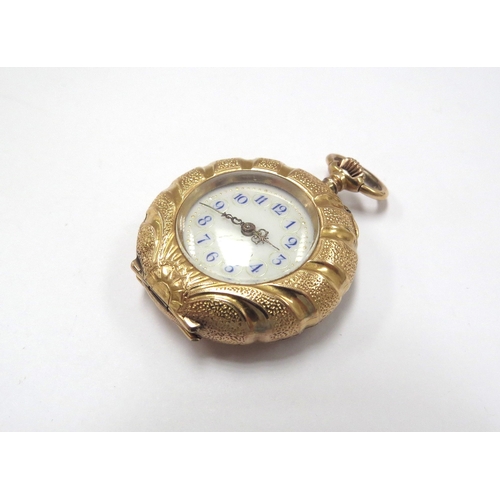 6123 - A ladies gold fob watch as a shell, engraved detail, stamped 18k, 21.4g total