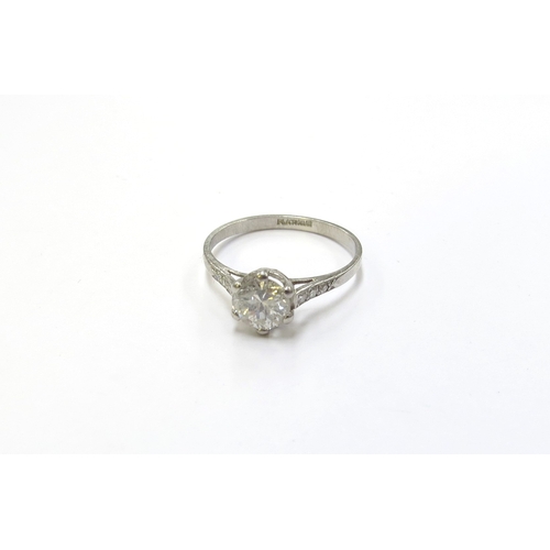 6132 - A platinum set diamond solitaire ring, 0.75ct approx flanked by diamond set shoulders. Size N, 2.3g