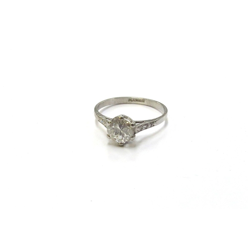 6132 - A platinum set diamond solitaire ring, 0.75ct approx flanked by diamond set shoulders. Size N, 2.3g