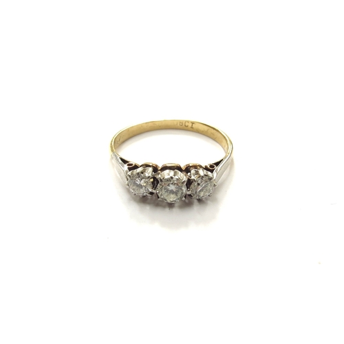 6259 - A three stone diamond ring, 0.48ct approx total, stamped 18ct. Size N, 2.2g