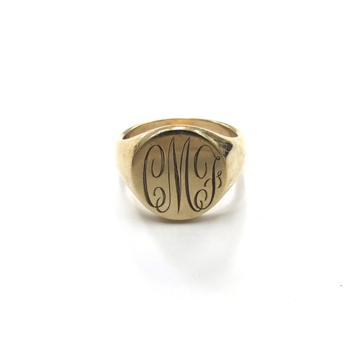 6321 - A 9ct gold monogrammed signet ring. Size V, 14.1g