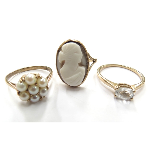 6094 - Three 9ct gold rings including cameo, size L/M, pearl cluster, size N and clear stone, size Q, 7.6g ... 