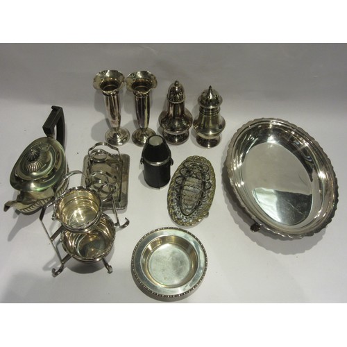 1026 - A box of miscellaneous plated ware to include; a pair of EPNS spill vases, base of entree dish, two ... 