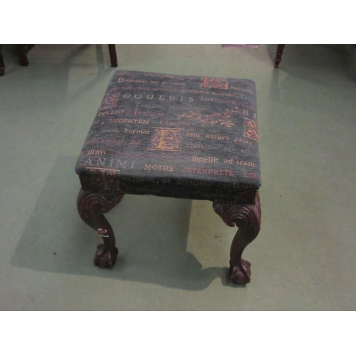 1035 - A mahogany footstool raised on ball and claw feet, with carved knees. 48x48x47cm