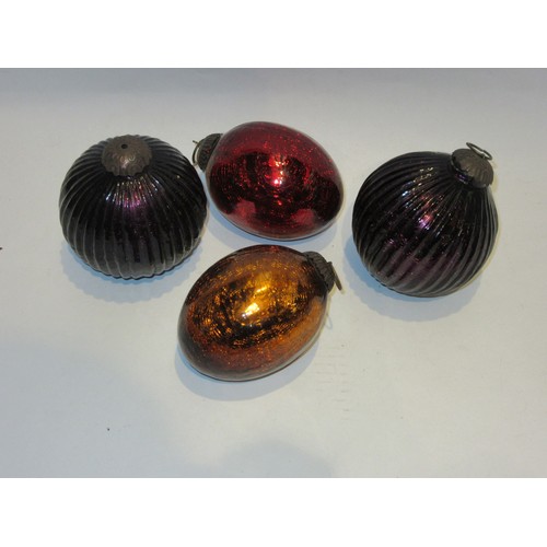 1019 - Four glass Christmas baubles, each approximately 10cm diameter.