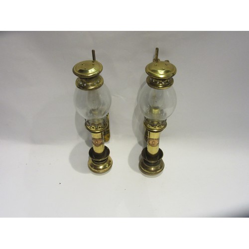 1014 - A pair of brass reproduction wall lights bearing copper plaque 'White Star Liverpool'. 32cm tall.