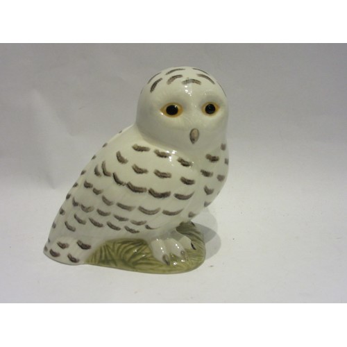 1011 - A box of miscellaneous to include a single crackle-glazed elephant book-end, ceramic owl money box, ... 