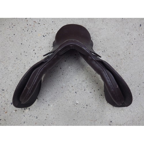 1060 - A brown synthetic leather pony saddle