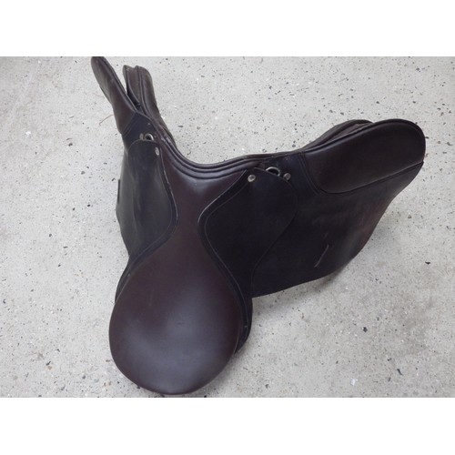 1060 - A brown synthetic leather pony saddle