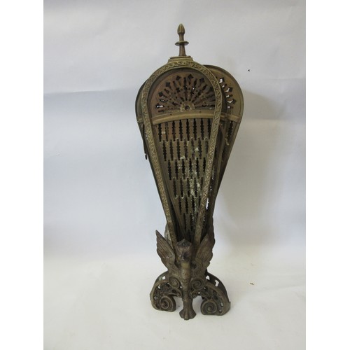 1066 - A folding brass peacock-tail fire guard with phoenix detail, 62.5cm tall. (a/f)