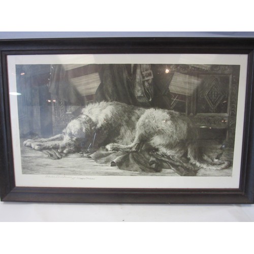 1046 - By and after Henry Dicksee: a framed and glazed black and white print showing a reclining wolfhound.... 