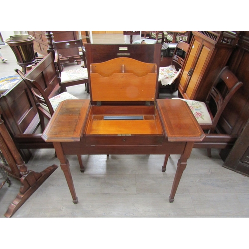 1140 - An Edwardian mahogany and satin wood strung fold top writing table 