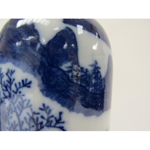 1187 - A near pair of Japanese blue and white ceramic vases with dwellings and rocky outcrop decoration, wi... 