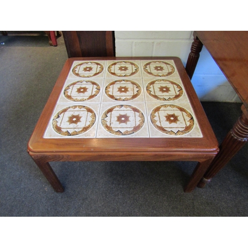 1203 - A G-Plan teak framed tile-top coffee table, 36cm tall x 71cm wide