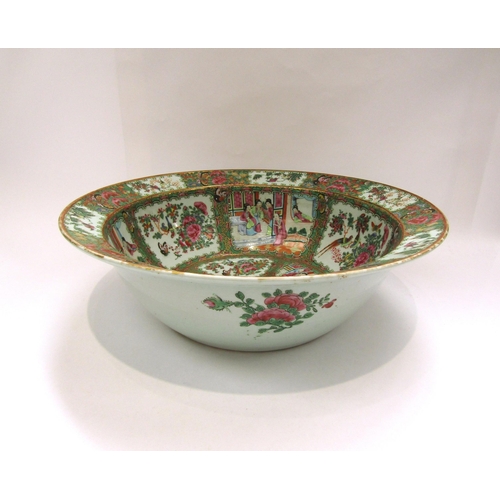 1212 - A late 19th Century highly ornate Canton flared rimmed bowl, the interior with multiple figural and ... 