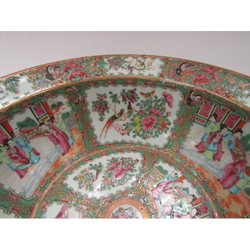 1212 - A late 19th Century highly ornate Canton flared rimmed bowl, the interior with multiple figural and ... 