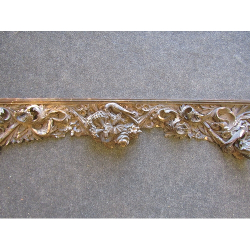 1245 - A large 17th Century lime wood carved frieze with scrolling foliate design, 158cm long, a/f