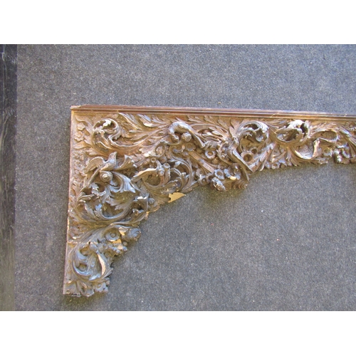 1245 - A large 17th Century lime wood carved frieze with scrolling foliate design, 158cm long, a/f