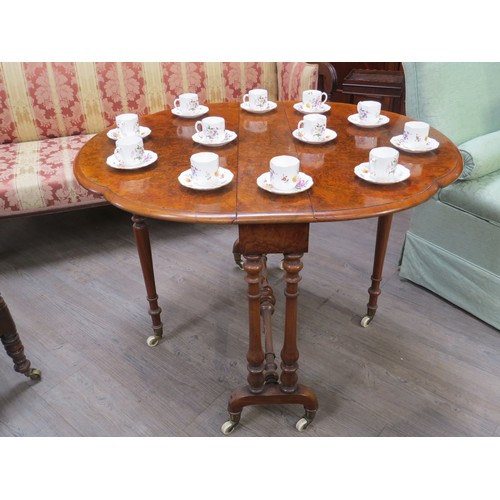 1266 - A Victorian burr walnut shaped top drop-leaf table on casters, 73cm x 91cm x 106.5cm