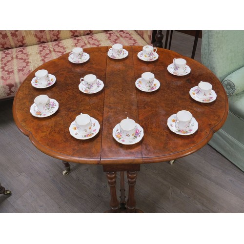 1266 - A Victorian burr walnut shaped top drop-leaf table on casters, 73cm x 91cm x 106.5cm