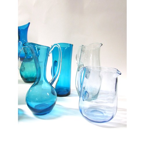 1539 - Eight various blue glass jugs including Whitefriars, plus Dartington tankard and similar carafe.  Ta... 