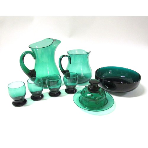 1537 - A collection of green glassware including jugs, glasses, bowl and a lidded dish.  Tallest 21.5cm