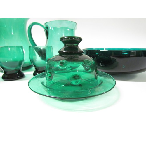 1537 - A collection of green glassware including jugs, glasses, bowl and a lidded dish.  Tallest 21.5cm