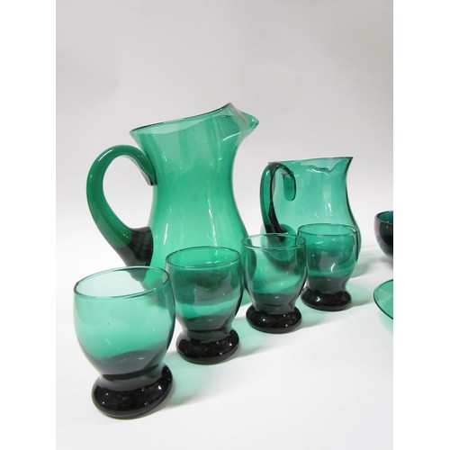 1537 - A collection of green glassware including jugs, glasses, bowl and a lidded dish.  Tallest 21.5cm