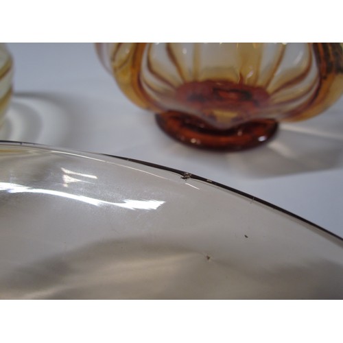 1542 - A Whitefriars waved bowl in Amber, 26.5cm diameter, a trailed bowl, 18cm and a pedestal bowl in dark... 