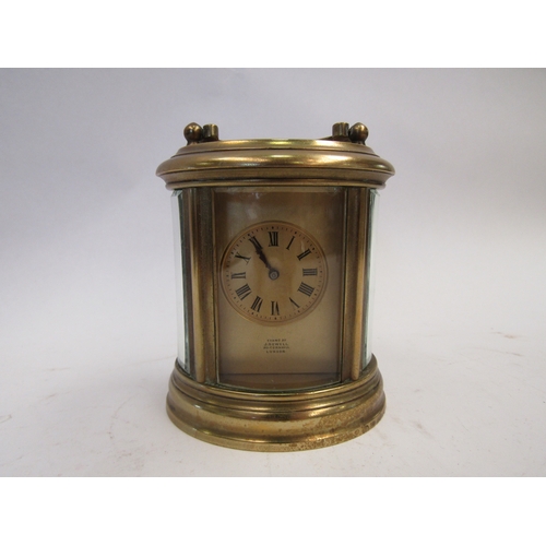 1519 - A J. Sewell brass cased carriage clock with key. 9.5cm height