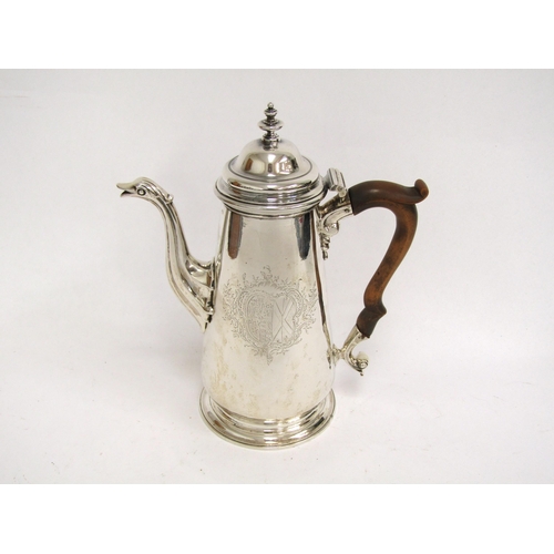 1520 - A George II Thomas Whipham silver coffee pot with bird spout detail, treen handle, with armorial cre... 