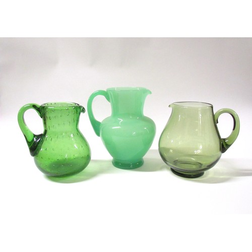 1548 - Three green glass jugs including bubble inclusions and apple opaline.  Tallest 20.5cm