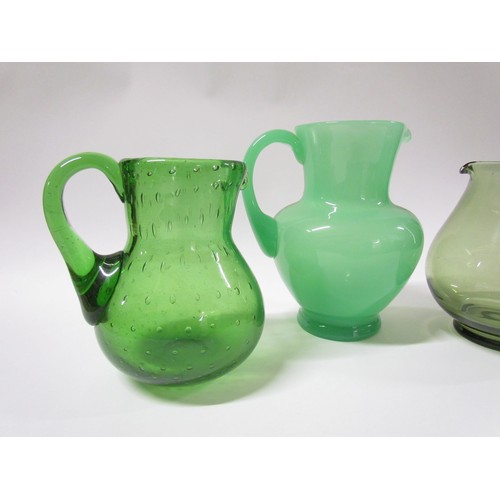 1548 - Three green glass jugs including bubble inclusions and apple opaline.  Tallest 20.5cm