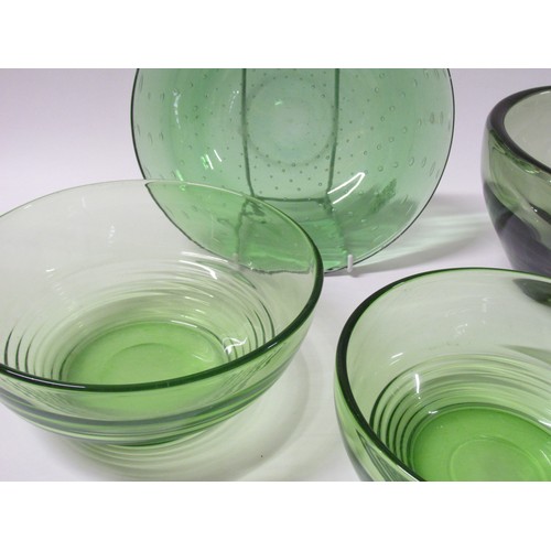 1550 - A collection of four green glass bowls including Whitefriars 9336 lobed, 12.5cm high.  Plus two grad... 