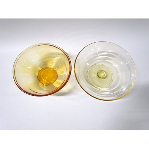 1554 - A pale amber glass pedestal bowl, 25cm diameter x 9.5cm high, together with a darker bowl with wave ... 