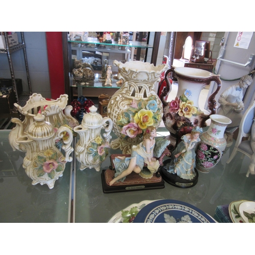 1588 - A Capodimonte set of four floral applied ceramics, a vase, basket and lidded jugs, one lid a/f. Also... 