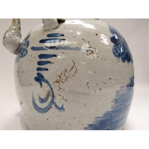 1103 - An 18th Century blue and white oversized Chinese teapot with figural design depicting person riding ... 