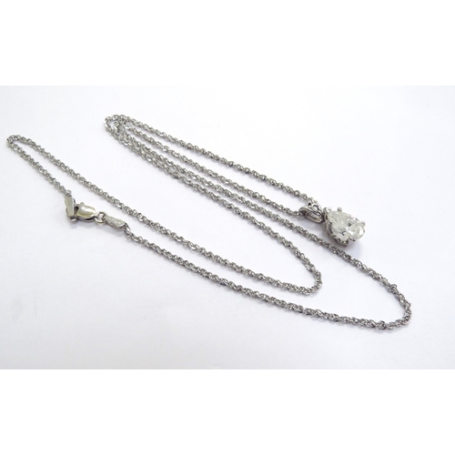 6395 - A pear cut single diamond pendant, 1.25ct approx hung on a white gold twisted curb style chain, 50cm... 