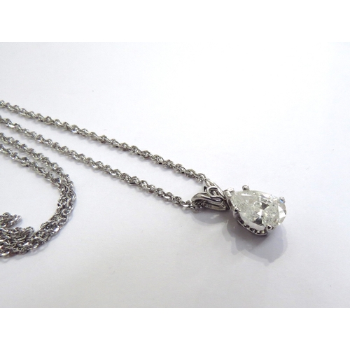 6395 - A pear cut single diamond pendant, 1.25ct approx hung on a white gold twisted curb style chain, 50cm... 