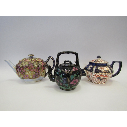 1423 - A Gilman Collamore & Co., New York, teapot, a Victorian black ground teapot overpainted in enamels a... 