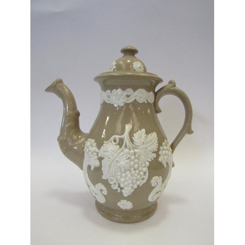 1424 - A Victorian stoneware coffee pot and cover decorated with grapes