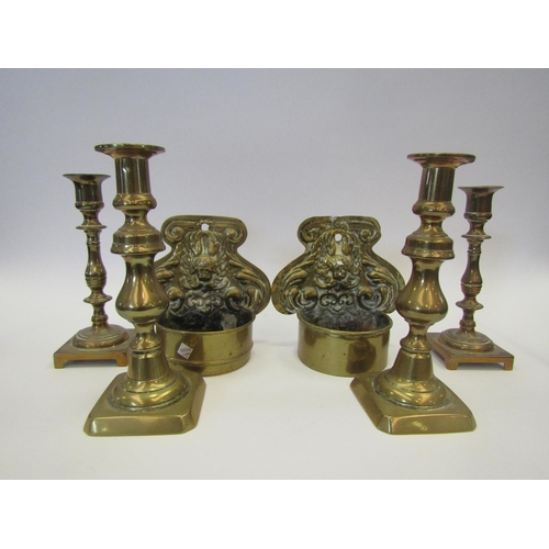 1431 - A pair of brass ejector candlesticks, 20cm tall, a similar pair, 18cm tall and two brass wall pocket... 