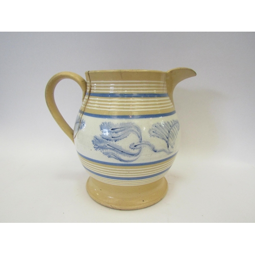 1439 - A large mid-19th Century mocha ware jug, a/f, 21cm tall