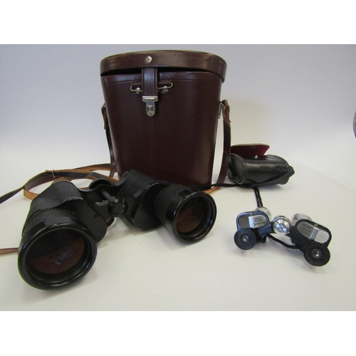 1441 - A cased pair of Carl Zeiss Jenoptem 10x50w binoculars, case a/f, and a pair of small Perl 8X,20 bino... 