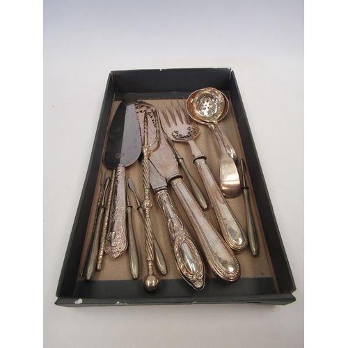 1487 - A box of plated flatware to include fish servers, bread fork, ladle, straining spoon, etc.