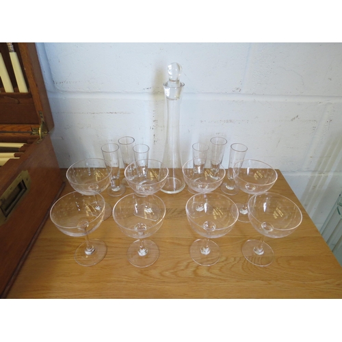 1120 - Eight champagne glasses with star cut design, six matching liqueur glasses and decanter (15)