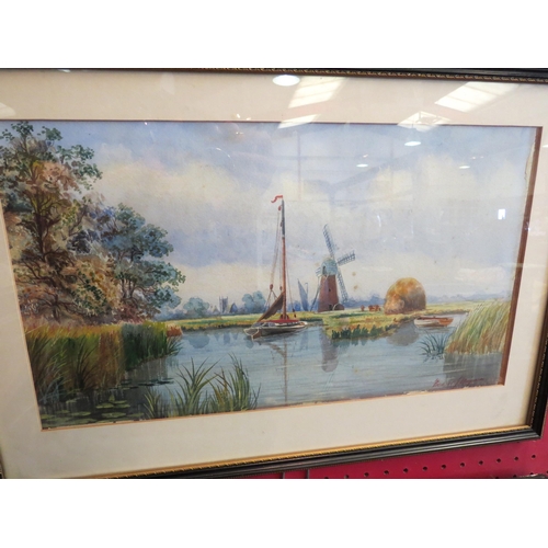 1173 - FREDERICK J.MARJORAM: A pair of watercolours depicting vessels in Norfolk Broads scenes, signed lowe... 