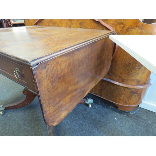 1226 - A 19th Century mahogany two drawer sofa table on brass castors