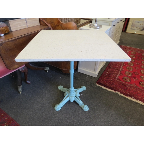 1248 - A blue painted cast iron base table with square quartz top, 73cm tall x 70.5cm squared top